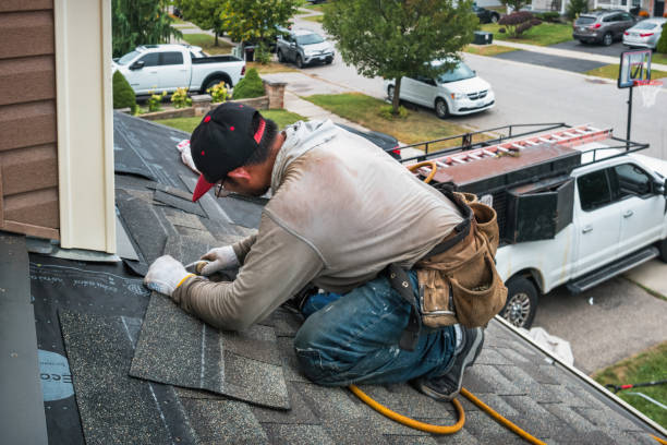Professional Roofing technician working in Old Town, ME
